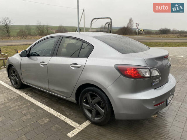 Серый Мазда 3, объемом двигателя 2 л и пробегом 200 тыс. км за 6999 $, фото 8 на Automoto.ua