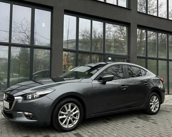 Серый Мазда 3, объемом двигателя 2 л и пробегом 146 тыс. км за 10700 $, фото 5 на Automoto.ua