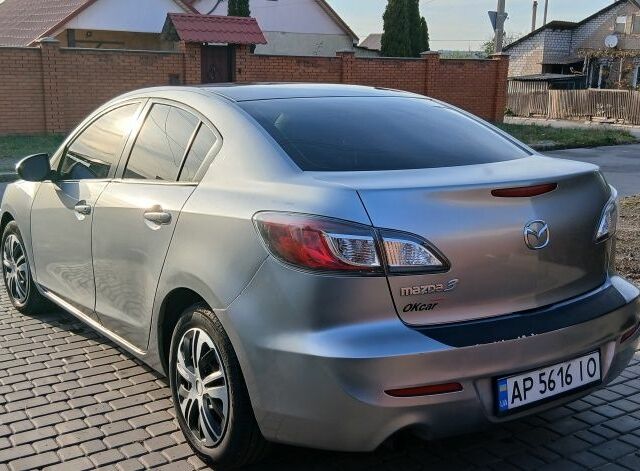 Серый Мазда 3, объемом двигателя 2 л и пробегом 225 тыс. км за 7200 $, фото 2 на Automoto.ua