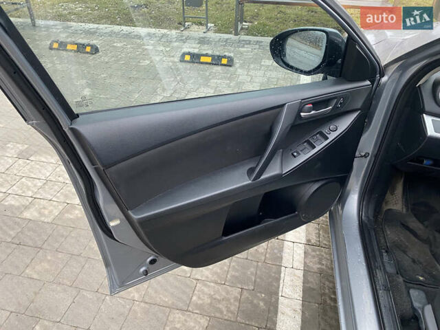 Серый Мазда 3, объемом двигателя 2 л и пробегом 200 тыс. км за 6999 $, фото 10 на Automoto.ua