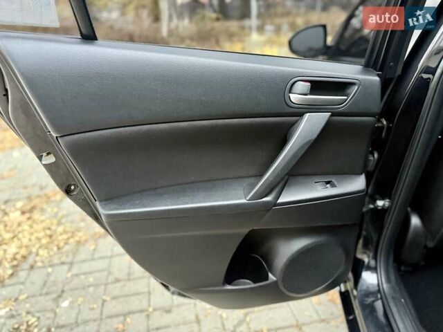 Серый Мазда 3, объемом двигателя 2 л и пробегом 158 тыс. км за 7999 $, фото 24 на Automoto.ua