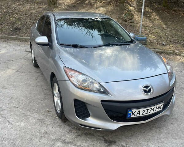 Серый Мазда 3, объемом двигателя 2 л и пробегом 170 тыс. км за 8700 $, фото 3 на Automoto.ua