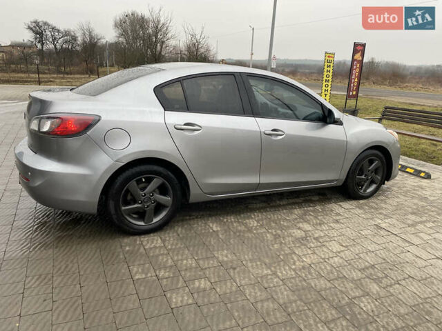Серый Мазда 3, объемом двигателя 2 л и пробегом 200 тыс. км за 6999 $, фото 6 на Automoto.ua