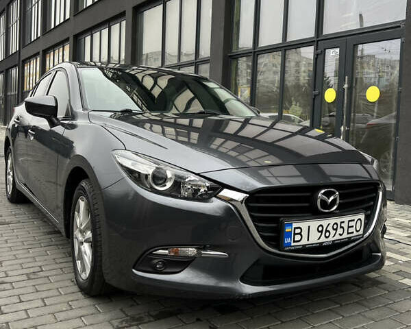 Серый Мазда 3, объемом двигателя 2 л и пробегом 146 тыс. км за 10700 $, фото 3 на Automoto.ua