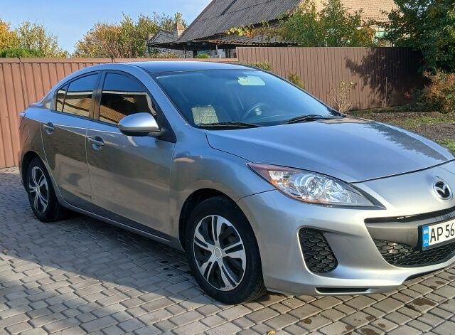Серый Мазда 3, объемом двигателя 2 л и пробегом 225 тыс. км за 7200 $, фото 1 на Automoto.ua