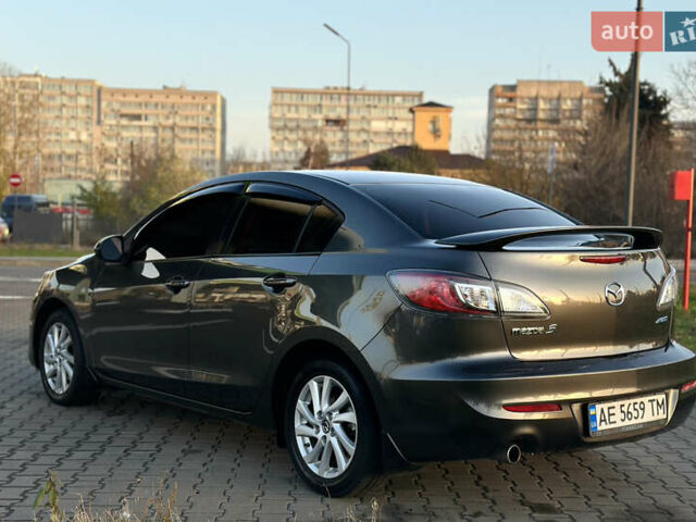 Сірий Мазда 3, об'ємом двигуна 2 л та пробігом 247 тис. км за 9500 $, фото 3 на Automoto.ua