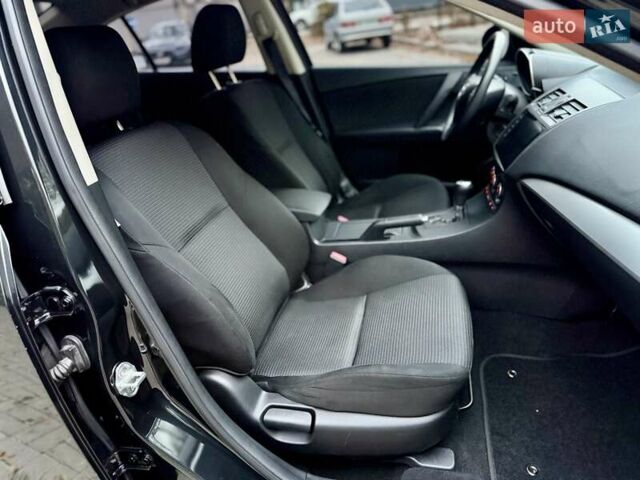 Серый Мазда 3, объемом двигателя 2 л и пробегом 158 тыс. км за 7999 $, фото 22 на Automoto.ua