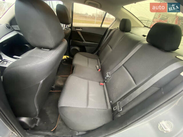 Серый Мазда 3, объемом двигателя 2 л и пробегом 200 тыс. км за 6999 $, фото 12 на Automoto.ua