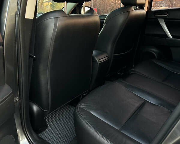 Сірий Мазда 3, об'ємом двигуна 2 л та пробігом 247 тис. км за 9500 $, фото 17 на Automoto.ua