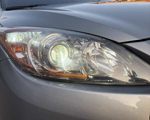 Серый Мазда 3, объемом двигателя 2 л и пробегом 106 тыс. км за 10500 $, фото 11 на Automoto.ua