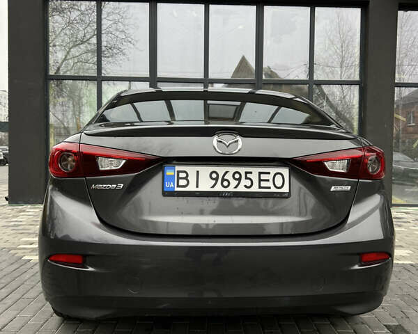 Серый Мазда 3, объемом двигателя 2 л и пробегом 146 тыс. км за 10700 $, фото 8 на Automoto.ua
