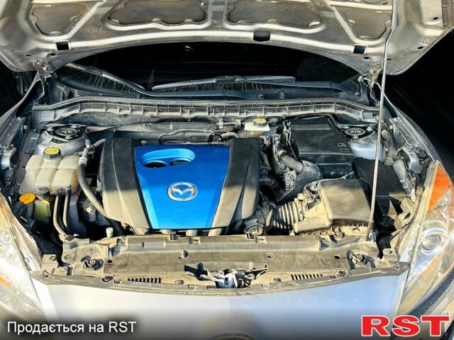 Серый Мазда 3, объемом двигателя 2 л и пробегом 106 тыс. км за 10300 $, фото 1 на Automoto.ua