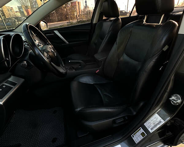 Сірий Мазда 3, об'ємом двигуна 2 л та пробігом 247 тис. км за 9500 $, фото 6 на Automoto.ua