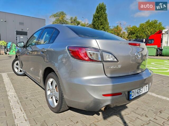 Серый Мазда 3, объемом двигателя 2 л и пробегом 252 тыс. км за 6799 $, фото 3 на Automoto.ua