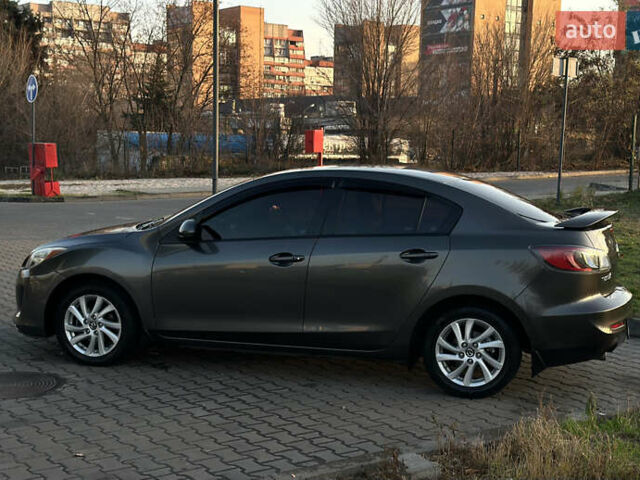 Сірий Мазда 3, об'ємом двигуна 2 л та пробігом 247 тис. км за 9500 $, фото 4 на Automoto.ua