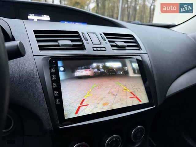 Серый Мазда 3, объемом двигателя 2 л и пробегом 158 тыс. км за 7999 $, фото 32 на Automoto.ua