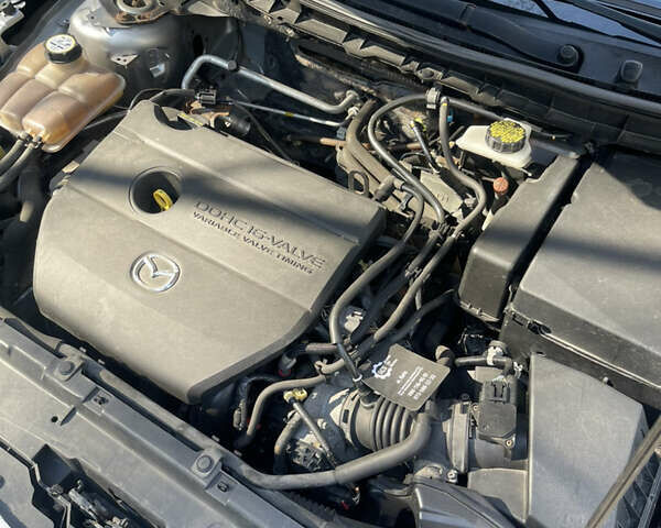 Серый Мазда 3, объемом двигателя 2 л и пробегом 170 тыс. км за 8700 $, фото 12 на Automoto.ua