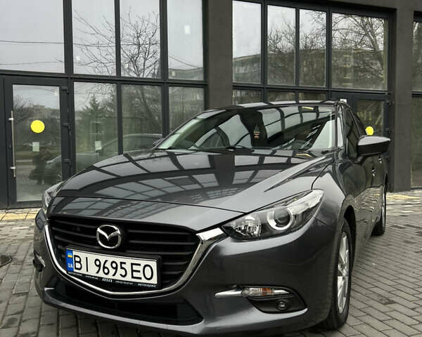Серый Мазда 3, объемом двигателя 2 л и пробегом 146 тыс. км за 10700 $, фото 1 на Automoto.ua