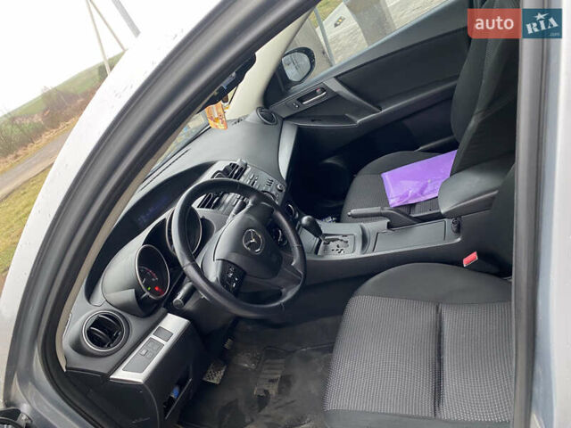 Серый Мазда 3, объемом двигателя 2 л и пробегом 200 тыс. км за 6999 $, фото 9 на Automoto.ua