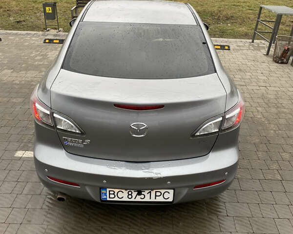 Серый Мазда 3, объемом двигателя 2 л и пробегом 200 тыс. км за 6999 $, фото 2 на Automoto.ua