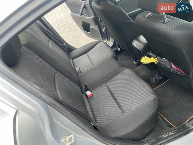 Серый Мазда 3, объемом двигателя 2 л и пробегом 200 тыс. км за 6999 $, фото 11 на Automoto.ua