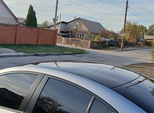 Серый Мазда 3, объемом двигателя 2 л и пробегом 225 тыс. км за 7200 $, фото 4 на Automoto.ua