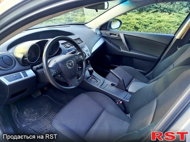 Сірий Мазда 3, об'ємом двигуна 2 л та пробігом 160 тис. км за 8500 $, фото 9 на Automoto.ua