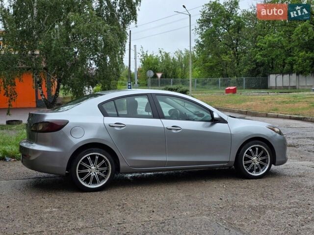 Сірий Мазда 3, об'ємом двигуна 2 л та пробігом 187 тис. км за 7999 $, фото 3 на Automoto.ua
