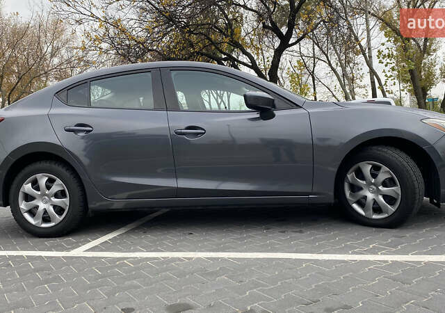 Сірий Мазда 3, об'ємом двигуна 2 л та пробігом 158 тис. км за 10490 $, фото 3 на Automoto.ua
