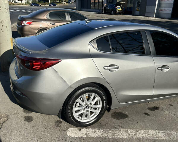 Серый Мазда 3, объемом двигателя 2 л и пробегом 141 тыс. км за 12200 $, фото 3 на Automoto.ua