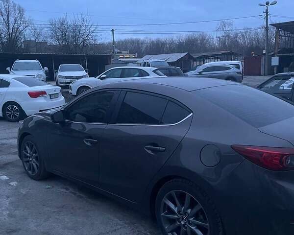 Серый Мазда 3, объемом двигателя 2 л и пробегом 54 тыс. км за 11000 $, фото 1 на Automoto.ua