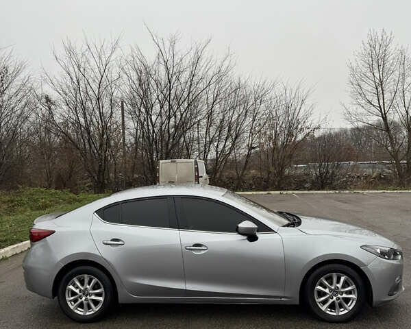 Сірий Мазда 3, об'ємом двигуна 2 л та пробігом 198 тис. км за 9200 $, фото 4 на Automoto.ua