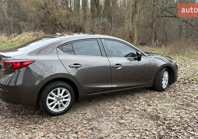 Серый Мазда 3, объемом двигателя 2 л и пробегом 104 тыс. км за 11300 $, фото 3 на Automoto.ua