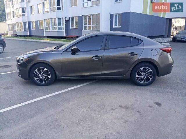 Сірий Мазда 3, об'ємом двигуна 2 л та пробігом 145 тис. км за 9900 $, фото 2 на Automoto.ua
