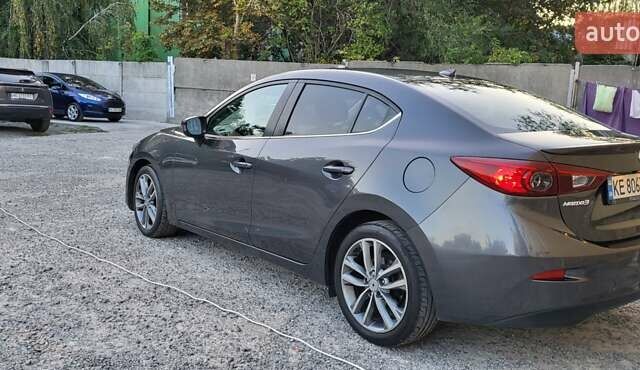 Серый Мазда 3, объемом двигателя 2 л и пробегом 148 тыс. км за 11999 $, фото 4 на Automoto.ua