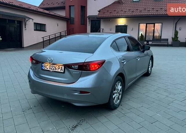 Серый Мазда 3, объемом двигателя 2 л и пробегом 146 тыс. км за 10600 $, фото 3 на Automoto.ua