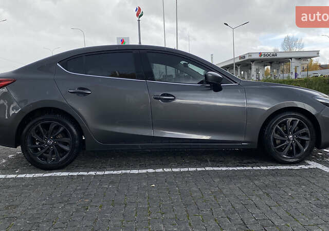 Сірий Мазда 3, об'ємом двигуна 2 л та пробігом 127 тис. км за 12500 $, фото 2 на Automoto.ua