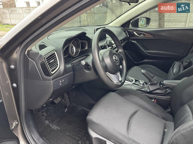 Серый Мазда 3, объемом двигателя 2 л и пробегом 134 тыс. км за 10700 $, фото 12 на Automoto.ua