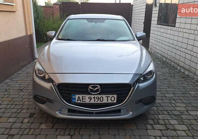 Серый Мазда 3, объемом двигателя 2 л и пробегом 141 тыс. км за 10700 $, фото 4 на Automoto.ua