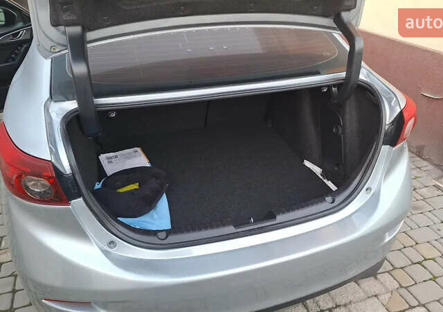 Серый Мазда 3, объемом двигателя 2 л и пробегом 141 тыс. км за 10700 $, фото 16 на Automoto.ua