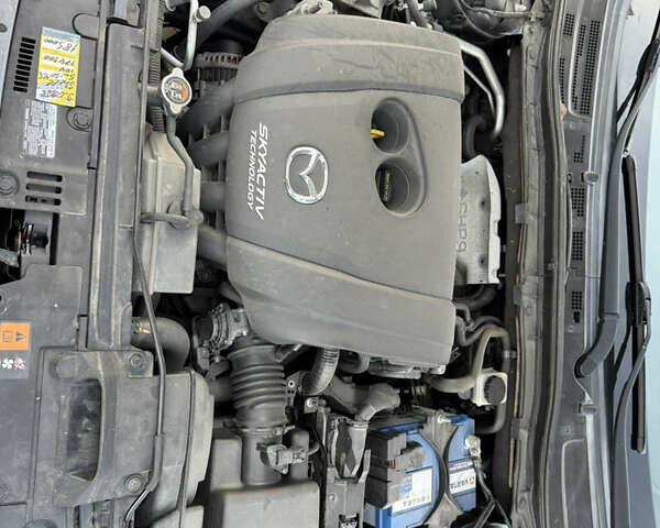 Серый Мазда 3, объемом двигателя 2 л и пробегом 176 тыс. км за 10700 $, фото 18 на Automoto.ua