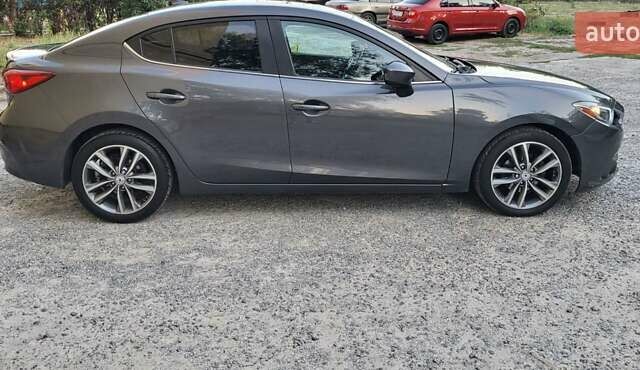 Серый Мазда 3, объемом двигателя 2 л и пробегом 148 тыс. км за 11999 $, фото 5 на Automoto.ua
