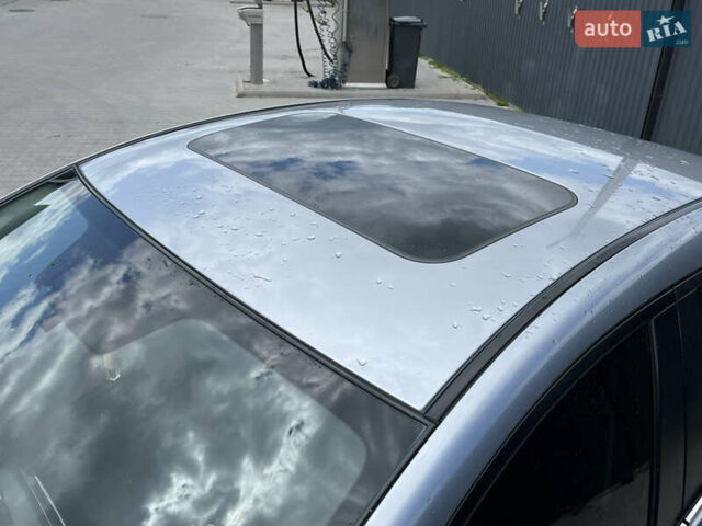 Сірий Мазда 3, об'ємом двигуна 2 л та пробігом 150 тис. км за 11800 $, фото 4 на Automoto.ua