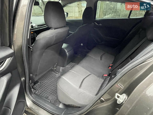 Серый Мазда 3, объемом двигателя 2 л и пробегом 134 тыс. км за 10700 $, фото 14 на Automoto.ua