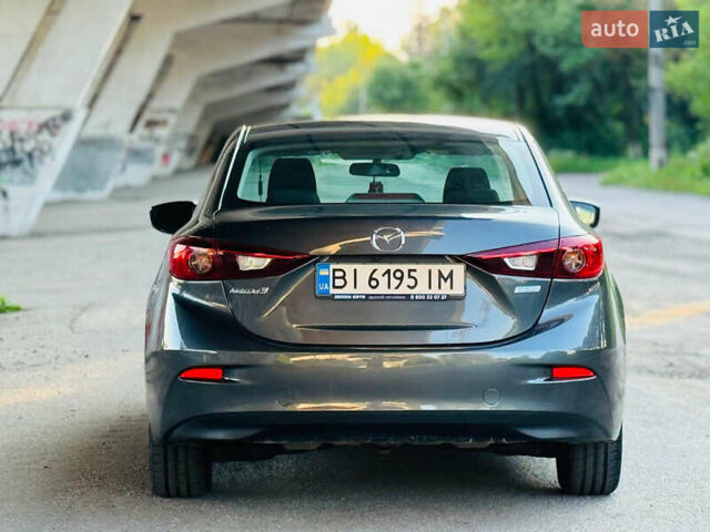 Сірий Мазда 3, об'ємом двигуна 2 л та пробігом 178 тис. км за 11300 $, фото 5 на Automoto.ua