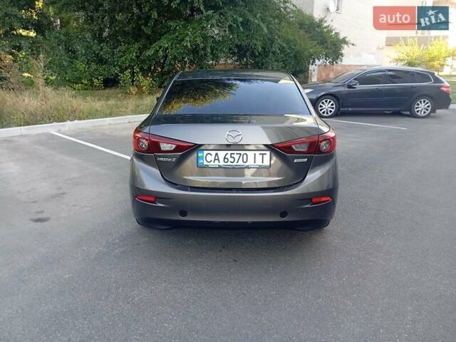 Сірий Мазда 3, об'ємом двигуна 2 л та пробігом 145 тис. км за 9900 $, фото 4 на Automoto.ua