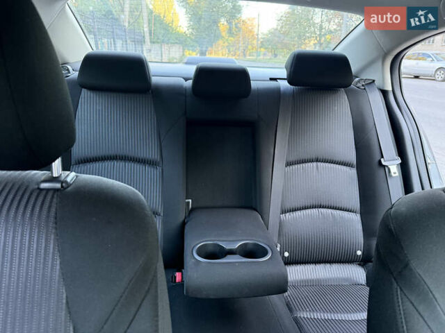 Серый Мазда 3, объемом двигателя 2 л и пробегом 186 тыс. км за 13000 $, фото 12 на Automoto.ua