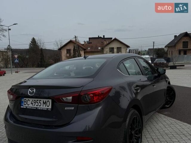 Серый Мазда 3, объемом двигателя 2 л и пробегом 91 тыс. км за 12000 $, фото 7 на Automoto.ua