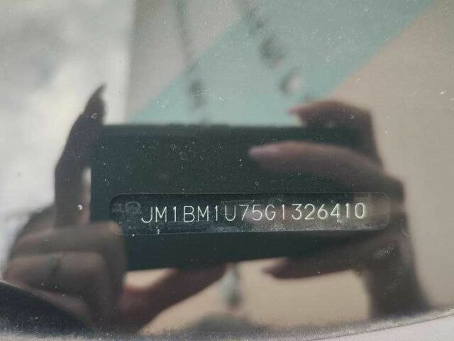 Серый Мазда 3, объемом двигателя 2 л и пробегом 178 тыс. км за 11000 $, фото 6 на Automoto.ua