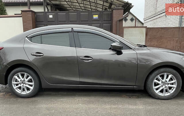 Серый Мазда 3, объемом двигателя 2 л и пробегом 134 тыс. км за 10700 $, фото 8 на Automoto.ua